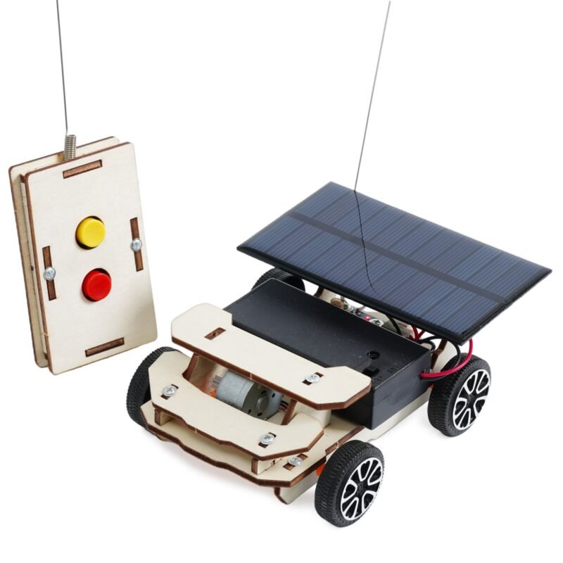 Child building a Remote Controlled Solar Race Car STEM engineering kit with working solar panel and wireless remote control.